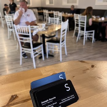 Surve - a business card on a table in a restaurant - New American Near Me - Sunbury, Ohio Surve - a business card on a table in a restaurant - New American Near Me - Sunbury, Ohio