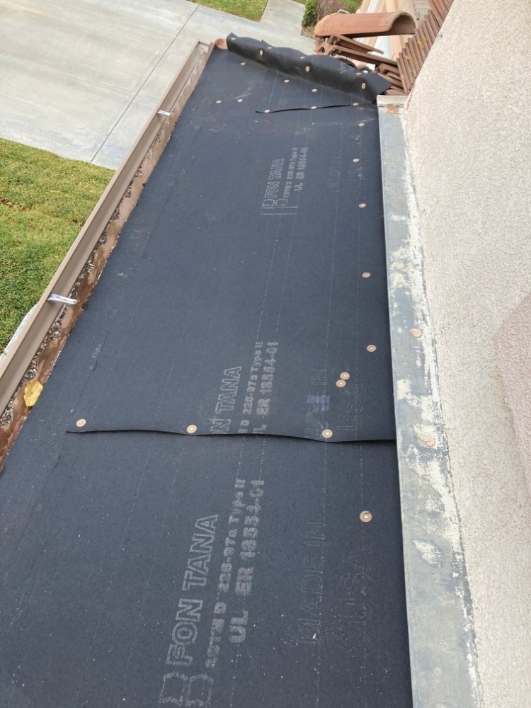 Slide of Lopez Roofing