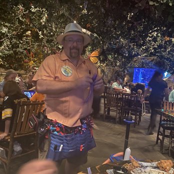 Rainforest Cafe - The gentleman who goes from table to table making ballon animals. Make sure to tip him. - American Near Me - Galveston, Texas Rainforest Cafe - The gentleman who goes from table to table making ballon animals. Make sure to tip him. - American Near Me - Galveston, Texas