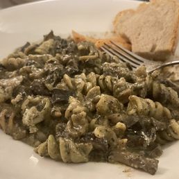a plate of pasta and bread