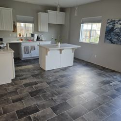 Simas Floor & Design Company - I bought a new home that came with this flooring but it was installed poorly. Nick and Chris came in and fixed it for me. Super clean now!