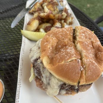 Wild Thyme Cafe - Elk burger with seasoned roasted potatoes. - Whiskey Bars Near Me - Springdale, Utah Wild Thyme Cafe - Elk burger with seasoned roasted potatoes. - Whiskey Bars Near Me - Springdale, Utah