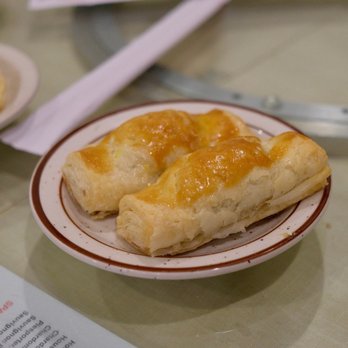 Shangri-La - a plate of pastries on a table - Dim Sum Near Me - West Bloomfield, Michigan Shangri-La - a plate of pastries on a table - Dim Sum Near Me - West Bloomfield, Michigan
