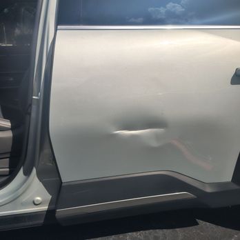 Fender Menders - This is my door before the repair I was told it needs to be replaced - Mobile Dent Repair Near Me - Kissimmee, Florida