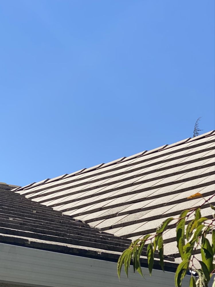 Slide of Eric Schweitzer Roofing