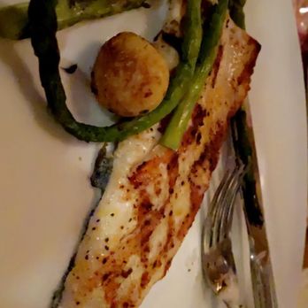 Seasons 52 - Half of the Trout entree we split with Bite Sized Potatoes & Asparagus. - New American Near Me - Altamonte Springs, Florida Seasons 52 - Half of the Trout entree we split with Bite Sized Potatoes & Asparagus. - New American Near Me - Altamonte Springs, Florida