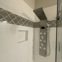 Gemstone Flooring & Remodeling - Upgraded shower head/wall.