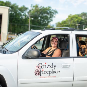 Grizzly Fireplace - a woman and her dog in a vehicle - Fireplace Services Near Me - Missoula, Montana