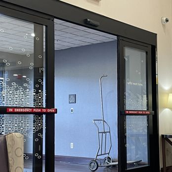 Hampton Inn & Suites Lamar - front door open  because Common area Air conditioning not working summer 2023. Flys everywhere as a result. Rooms are fine. - Hotels Near Me - Mill Hall, Pennsylvania