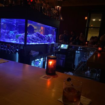Low Spark - a bar with a fish tank in the background - Bars Near Me - Cincinnati, Ohio