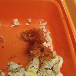 Hash brown (very brown) sticks and rubbery eggs. Hash brown (very brown) sticks and rubbery eggs.