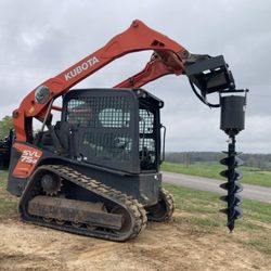 Loren’s Skid Steer Services - Hole Auguring 12" and 9" diameter , 4 feet deep