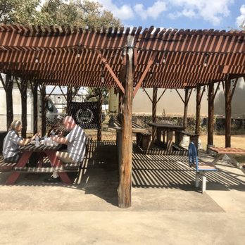 Fitties BBQ - Fitties only has outdoor seating under this nice pergola. - Barbeque Near Me - Bastrop, Texas Fitties BBQ - Fitties only has outdoor seating under this nice pergola. - Barbeque Near Me - Bastrop, Texas