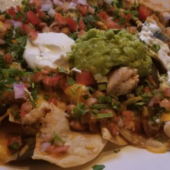 Yard House - Chicken Nachos, loads of toppings huge hot plate - Bars Near Me - Houston, Texas Yard House - Chicken Nachos, loads of toppings huge hot plate - Bars Near Me - Houston, Texas