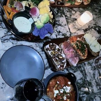 Postino Heights - Outside area, The Bounty (serves 4-6), 2 Bruschetta Platter (serves 4-6), Meatballs & Goat Cheese (serves 4-6) wine, beer and lemonade - Wine Bars Near Me - Houston, Texas Postino Heights - Outside area, The Bounty (serves 4-6), 2 Bruschetta Platter (serves 4-6), Meatballs & Goat Cheese (serves 4-6) wine, beer and lemonade - Wine Bars Near Me - Houston, Texas