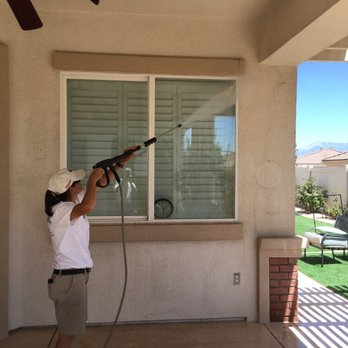 South West Window Cleaning - Grace pressure washing a customers home - Window Washing Near Me South West Window Cleaning - Grace pressure washing a customers home - Window Washing Near Me