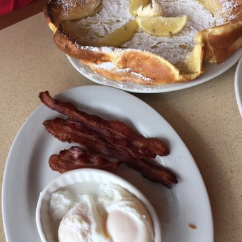 Egg N' Joe - Pancake combo- German pancake with bacon and porched eggs. - American Near Me - Gilbert, Arizona Egg N' Joe - Pancake combo- German pancake with bacon and porched eggs. - American Near Me - Gilbert, Arizona