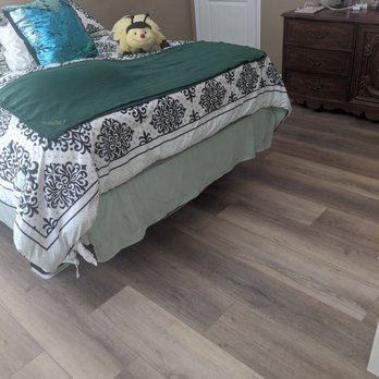 Williams Flooring America - a bedroom with a bed and a dresser - Flooring Near Me - Atascadero, California Williams Flooring America - a bedroom with a bed and a dresser - Flooring Near Me - Atascadero, California