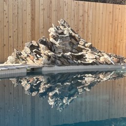 New 2x2 off white pool tile installed and calcium buildup removed on our fountain.
