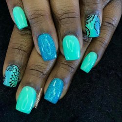 Tangle's Hair Designers & Day Spa