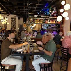 Liberatore's - Great wine bar with tables surrounding the bar. Relaxing calm atmosphere.