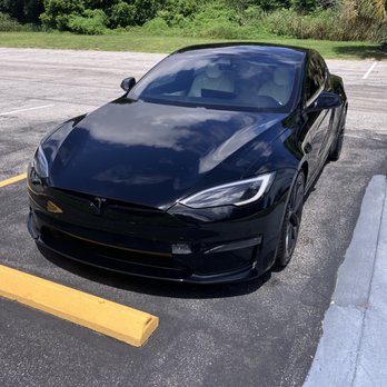 Dolphin Mobile Detail - Mobile auto detailing hand wash and paint gloss finish on a Tesla Model S in Titusville, FL - Auto Detailing Near Me - Melbourne, Florida Dolphin Mobile Detail - Mobile auto detailing hand wash and paint gloss finish on a Tesla Model S in Titusville, FL - Auto Detailing Near Me - Melbourne, Florida