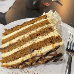 Oh So Good Desserts & Coffeehouse - Carrot monster cake was too dry and too cold. The other side of the icing is cracked.