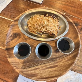 Junpuu - garlic gyoza with a heaping pile of dried garlic! - Ramen Near Me - Honolulu, Hawaii