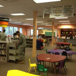 Phenix City-Russell County Library - Children's center. Children books, arts and crafts. Here Army OCS candidates are preparing to read to the children!