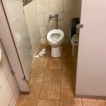 Panera Bread - a bathroom with a toilet and a roll of toilet paper - Salad Near Me - Richmond, Virginia