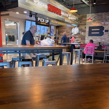 True Texas BBQ - a man sitting at a table - Barbeque Near Me - Kerrville, Texas True Texas BBQ - a man sitting at a table - Barbeque Near Me - Kerrville, Texas