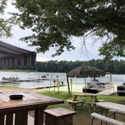 Wolf's Den Rv Campground - Patio outside. Enjoy a cool drink in a quiet part of the lake. Watch the blue heron and eagles fly by.