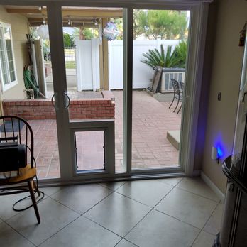 Hometime Windows & Doors - Slder with doggy door - Windows Installation Near Me - Escondido, California