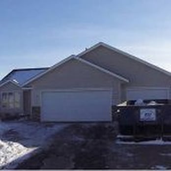 Glacier Companies - a house with a dumpster in front of it - General Contractors Near Me - Lakeville, Minnesota Glacier Companies - a house with a dumpster in front of it - General Contractors Near Me - Lakeville, Minnesota