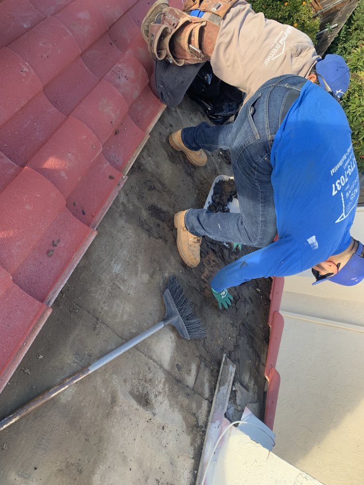 Slide of M G Roofing