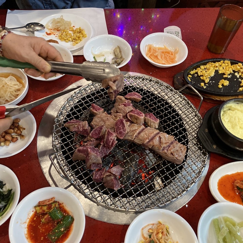 Mapo BBQ - We've already dug into a couple of the sides. In a few minutes many of those dishes, and all of the steak, will be gone. - Korean Near Me - Flushing, New York Mapo BBQ - We've already dug into a couple of the sides. In a few minutes many of those dishes, and all of the steak, will be gone. - Korean Near Me - Flushing, New York