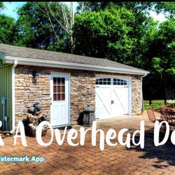 J & A Overhead Door - Carriage house door we did on a small shed.
