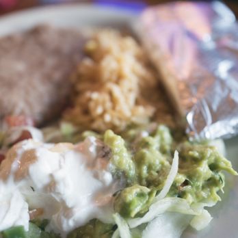 El Secreto De Abuela - Fajitas come with sour cream, guac, homemade tortillas, pico de gallo, rice, and beans. - Mexican Near Me - Austin, Texas