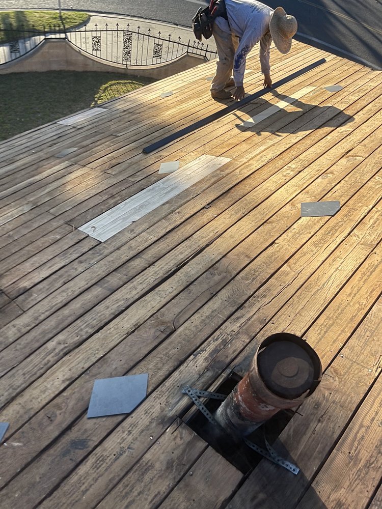 Slide of Pacific Roofing