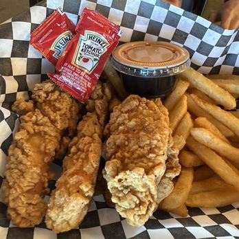 The Grizzly Bite - Chicken tenders with fries basket. - Burgers Near Me
