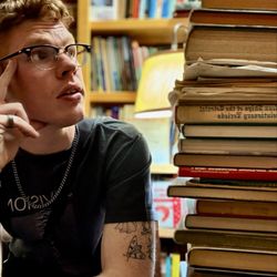 The Way We Were Bookshop - Stack of books in a reading corner.