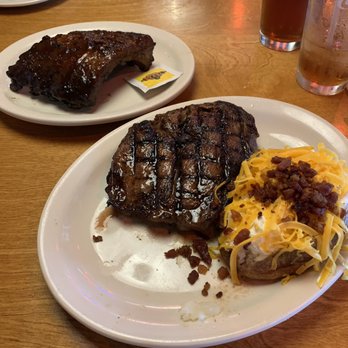Texas Roadhouse - My 16 oz ribeye with loaded baked potato and sidekick of ribs - Steakhouses Near Me - West Monroe, Louisiana Texas Roadhouse - My 16 oz ribeye with loaded baked potato and sidekick of ribs - Steakhouses Near Me - West Monroe, Louisiana