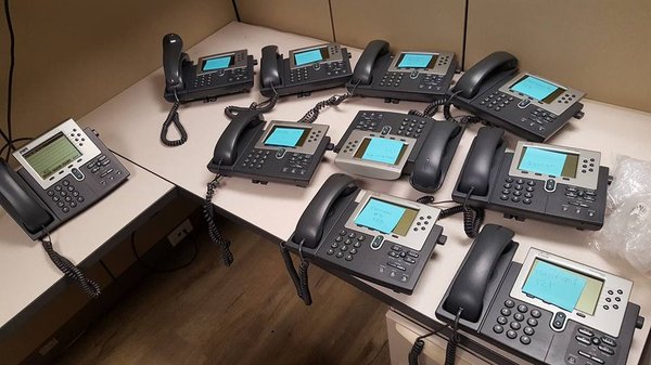 Photo of 3Packet.com - Anaheim, CA, US. Readying LOTS OF phones for install...