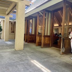 Sacred Hearts Mission Church - Outdoor patio of overflowing Sunday morning Mass