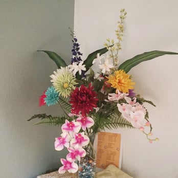 The Collection Massage - Tropical floral arrangements decorate the room. - Massage Near Me - San Diego, California The Collection Massage - Tropical floral arrangements decorate the room. - Massage Near Me - San Diego, California