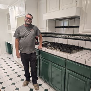 Lightfeldt Construction - Greg Lightfeldt after replacing a new cooktop. - General Contractors Near Me