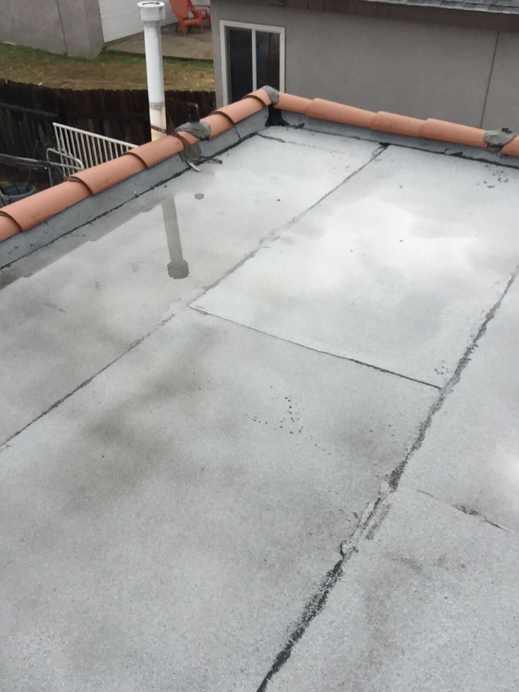 Slide of Penny Roofing