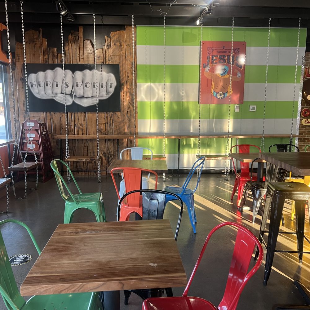 Hurts Donut Company - Seating area including swings - Donuts Near Me - Omaha, Nebraska Hurts Donut Company - Seating area including swings - Donuts Near Me - Omaha, Nebraska