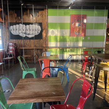 Hurts Donut Company - Seating area including swings - Donuts Near Me - Omaha, Nebraska Hurts Donut Company - Seating area including swings - Donuts Near Me - Omaha, Nebraska