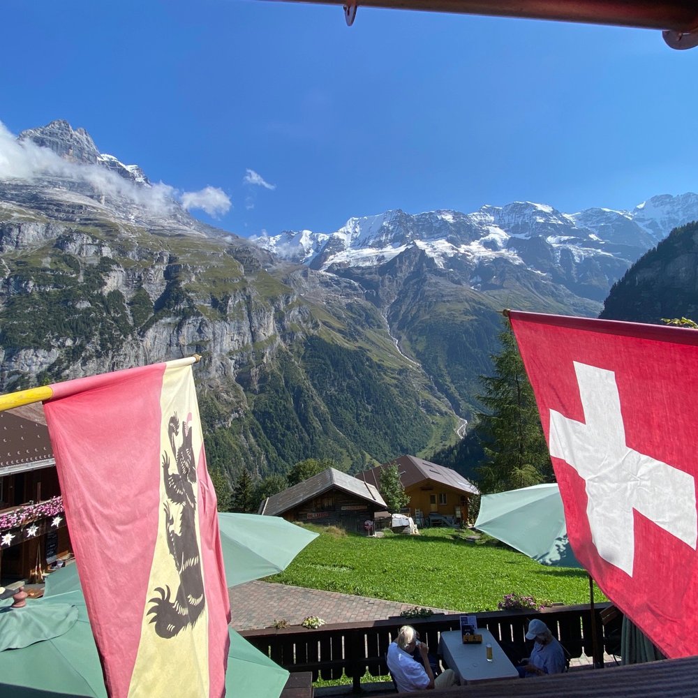 Pension Gimmelwald - View from upstairs terrace - Swiss Food Near Me - Gimmelwald, BE Pension Gimmelwald - View from upstairs terrace - Swiss Food Near Me - Gimmelwald, BE
